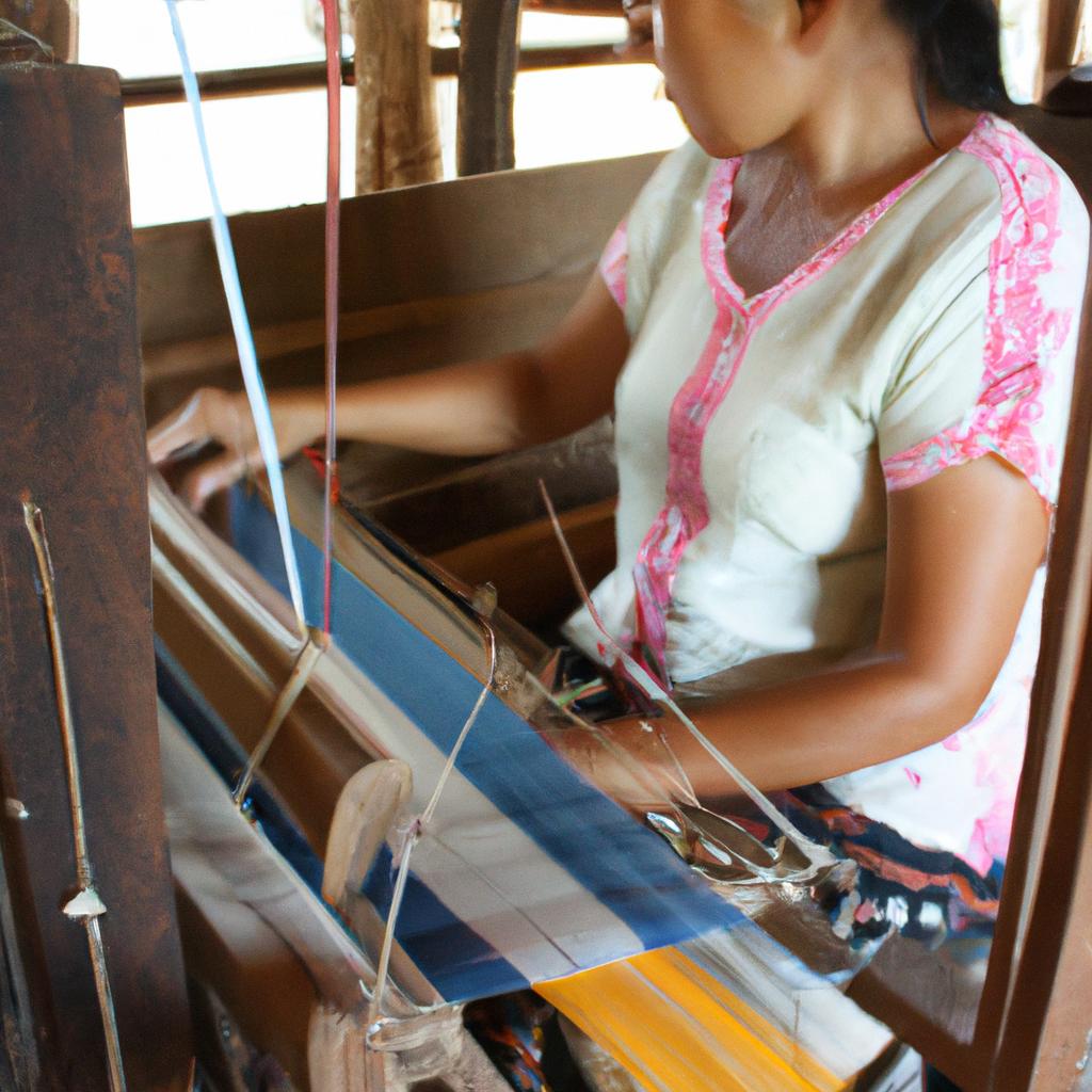 Woman weaving traditional Thai textiles